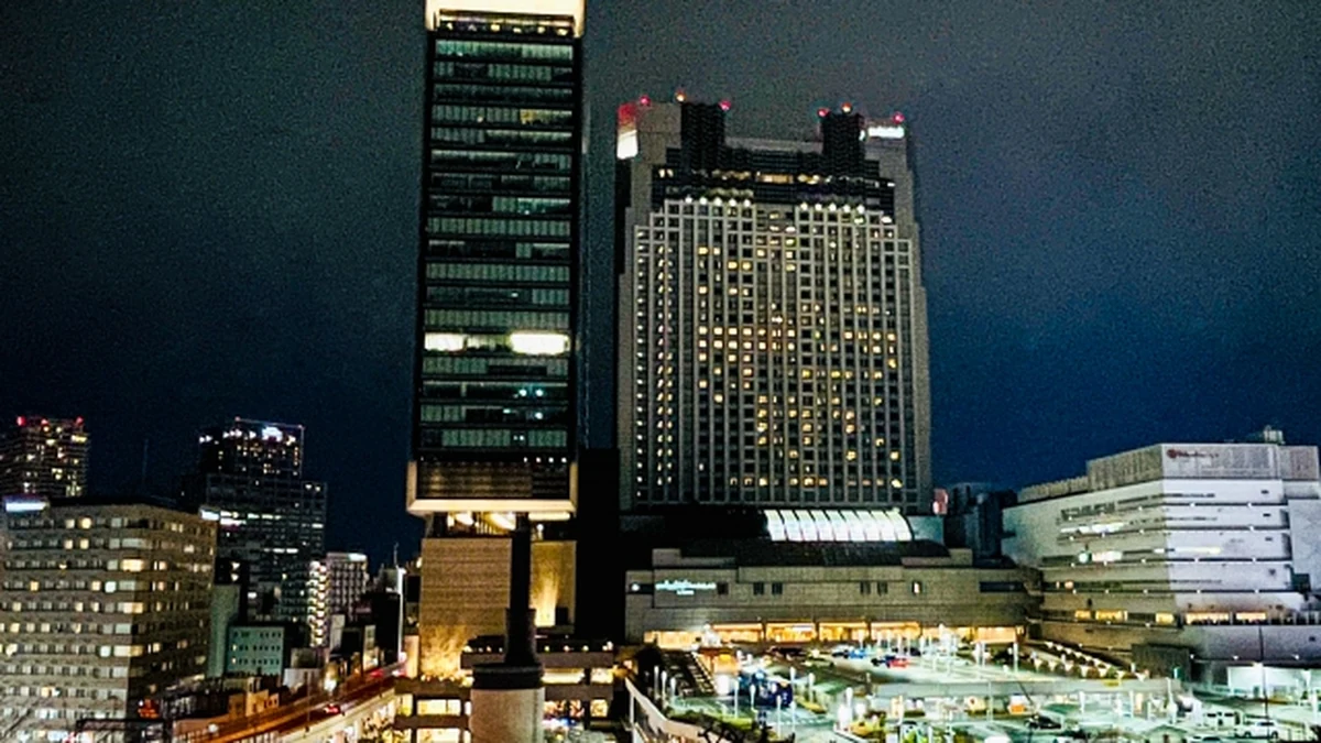 Dotonbori canal in Osaka lit up at night, the classic first-evening food walk